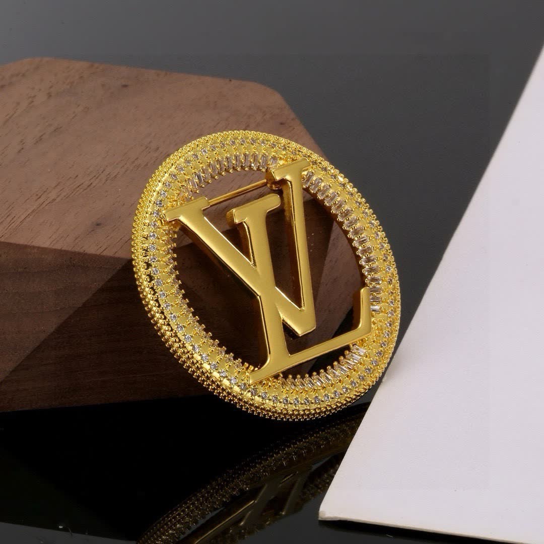 Louis Vuitton Gold Tone Logo Brooch with Rhinestones